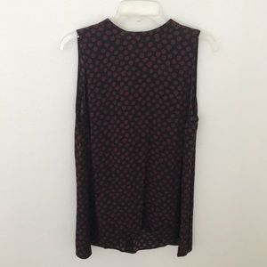 Maroon polka dot sleeveless blouse